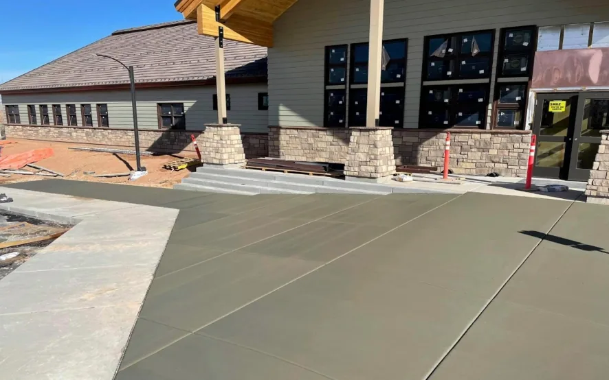 Commercial concrete flatwork poured along the front of a retail building in Oklahoma City